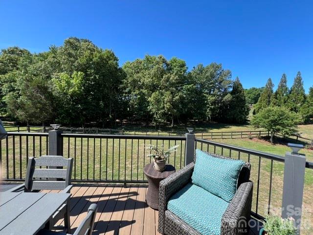 183 Burl Bridges Road Forest City, NC 28043 - Photo 28 of 31 a view of a two chairs in the deck