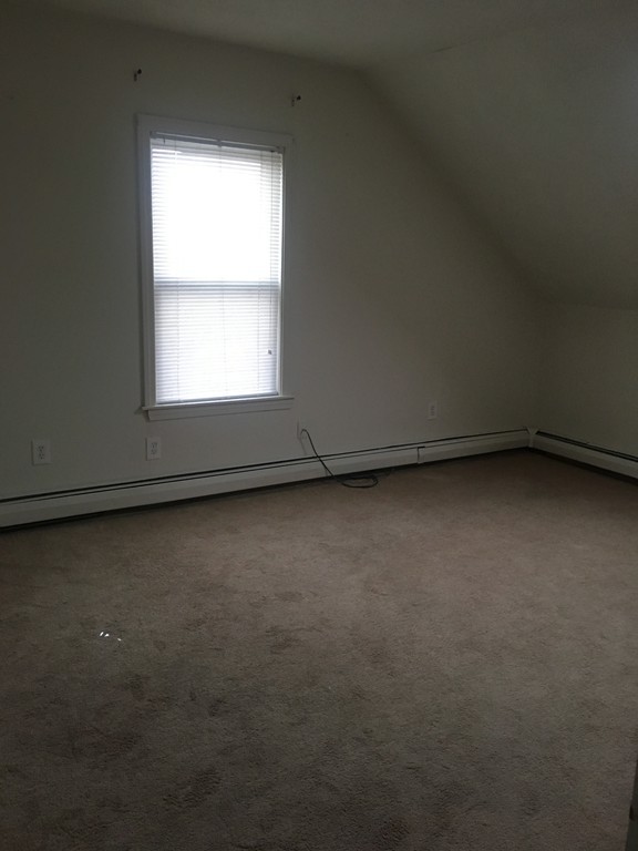 128 Stewart Street Fall River, MA 02720 - Photo 14 of 14 an empty room with a window
