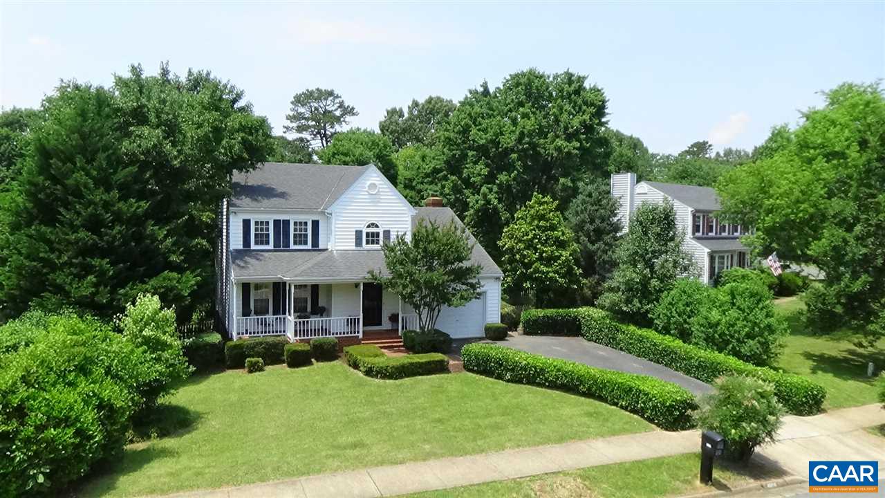 1606 Old Brook Road Charlottesville, VA 22901 - Photo 1 of 32 a front view of a house with yard and green space