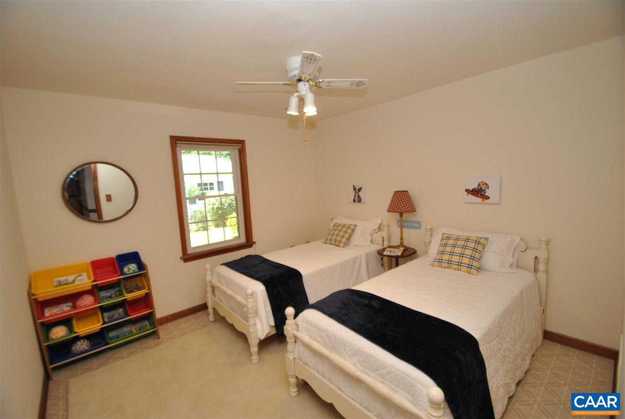 1606 Old Brook Road Charlottesville, VA 22901 - Photo 25 of 32 a bedroom with two beds and a window
