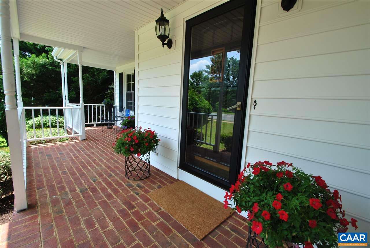 1606 Old Brook Road Charlottesville, VA 22901 - Photo 4 of 32 a view of a porch with furniture