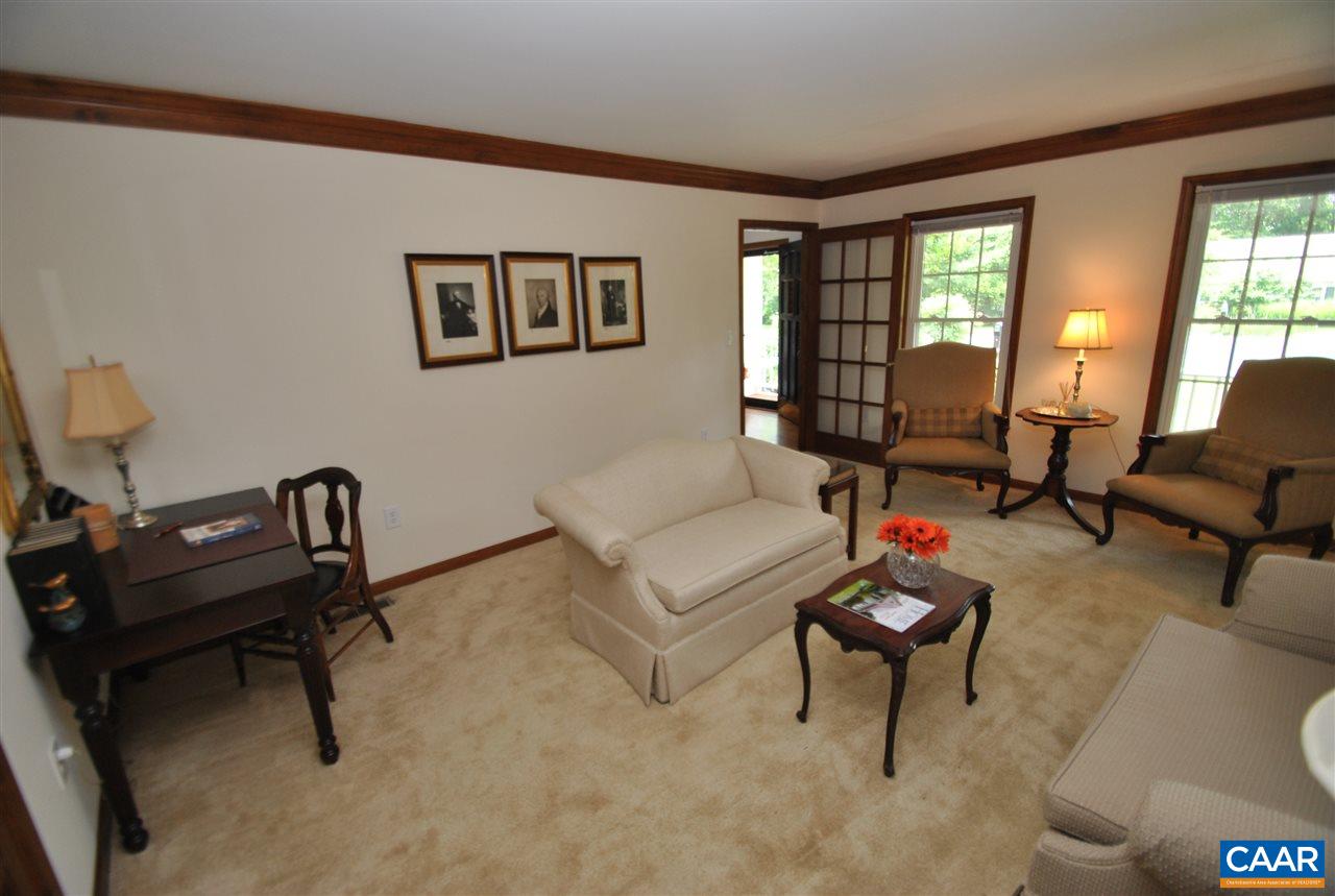 1606 Old Brook Road Charlottesville, VA 22901 - Photo 8 of 32 a living room with furniture and a window