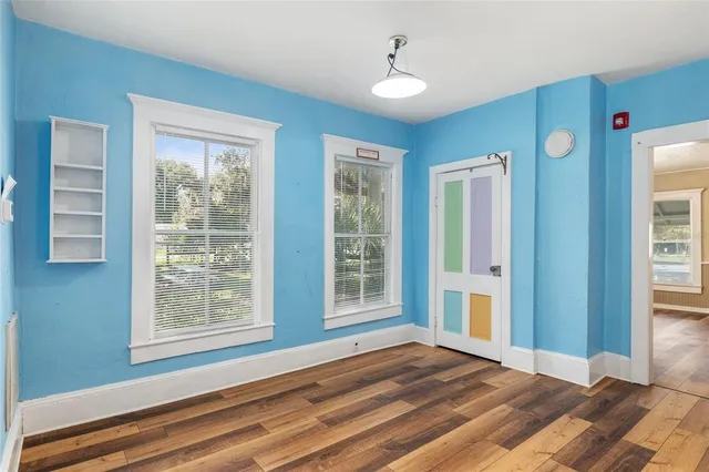 a kitchen with sink cabinets and window