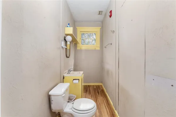 a kitchen with a sink and a window