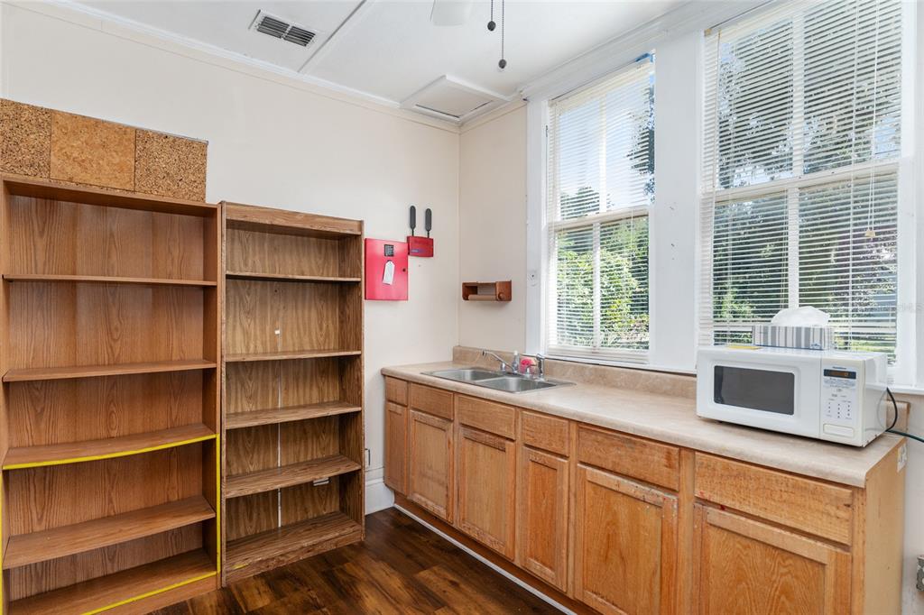 5610 Avenue G McIntosh, FL 32664 - Photo 33 of 64 a kitchen with a sink and a window