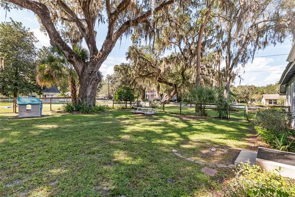 a view of backyard with green space