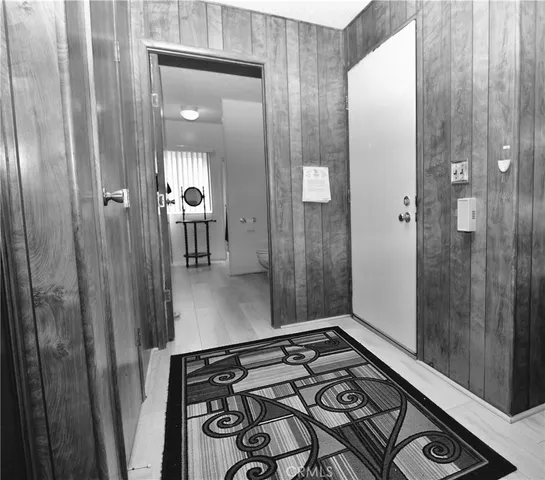 a bathroom with a mirror and a shower