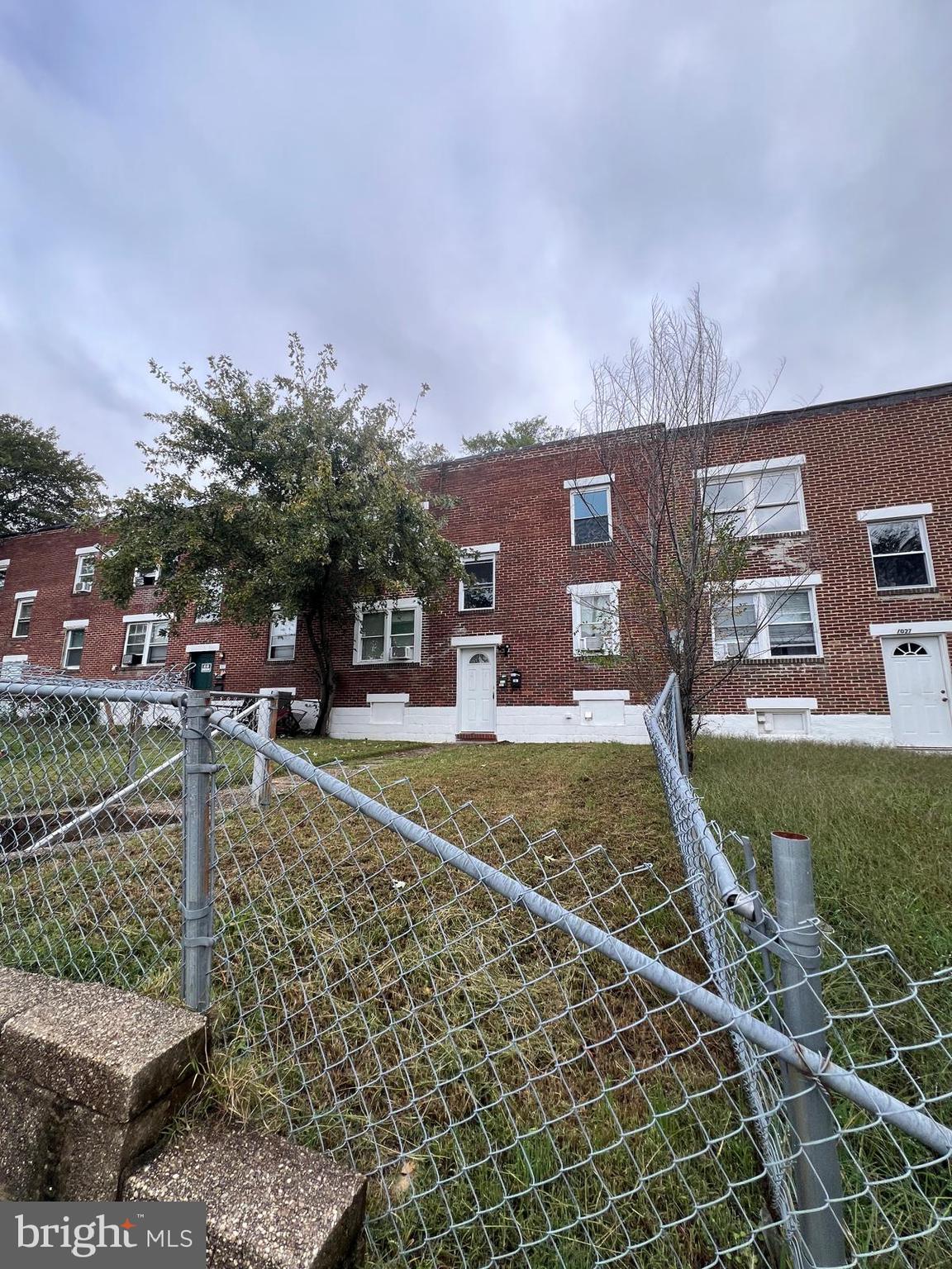 1025 Elton Avenue Baltimore, MD 21224 - Photo 2 of 11 a front view of a house with garden