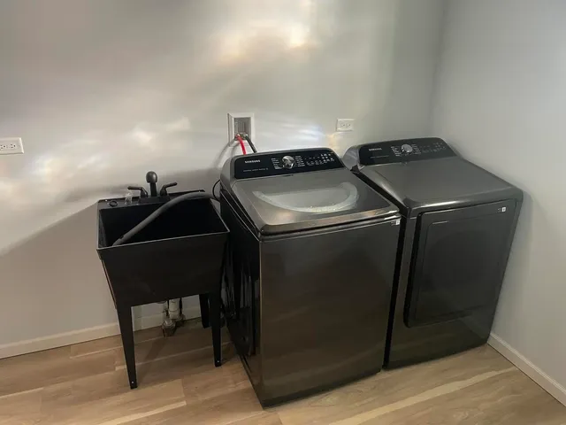 a utility room with dryer and washer