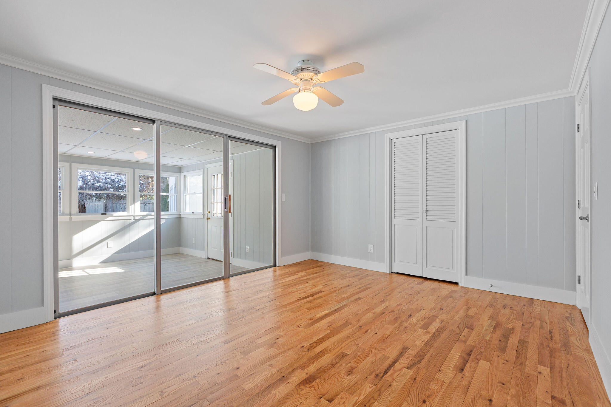 200 Lumbert Mill Road Centerville, MA 02632 - Photo 23 of 63 a view of an empty room with glass door and a window