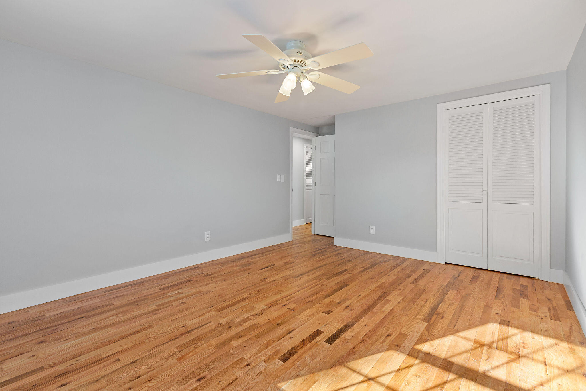 200 Lumbert Mill Road Centerville, MA 02632 - Photo 29 of 63 a view of an empty room with wooden floor