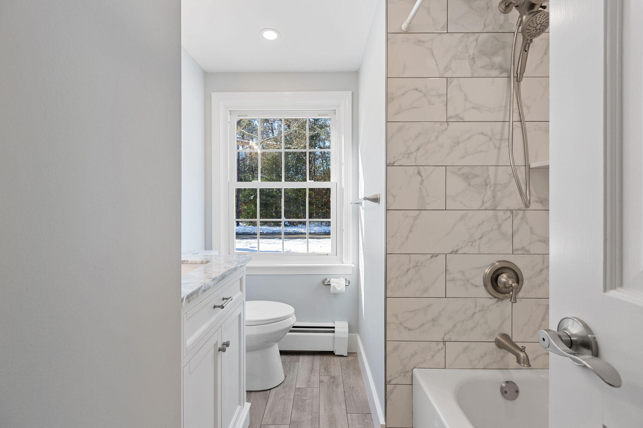 200 Lumbert Mill Road Centerville, MA 02632 - Photo 30 of 63 a bathroom with a bathtub and a toilet