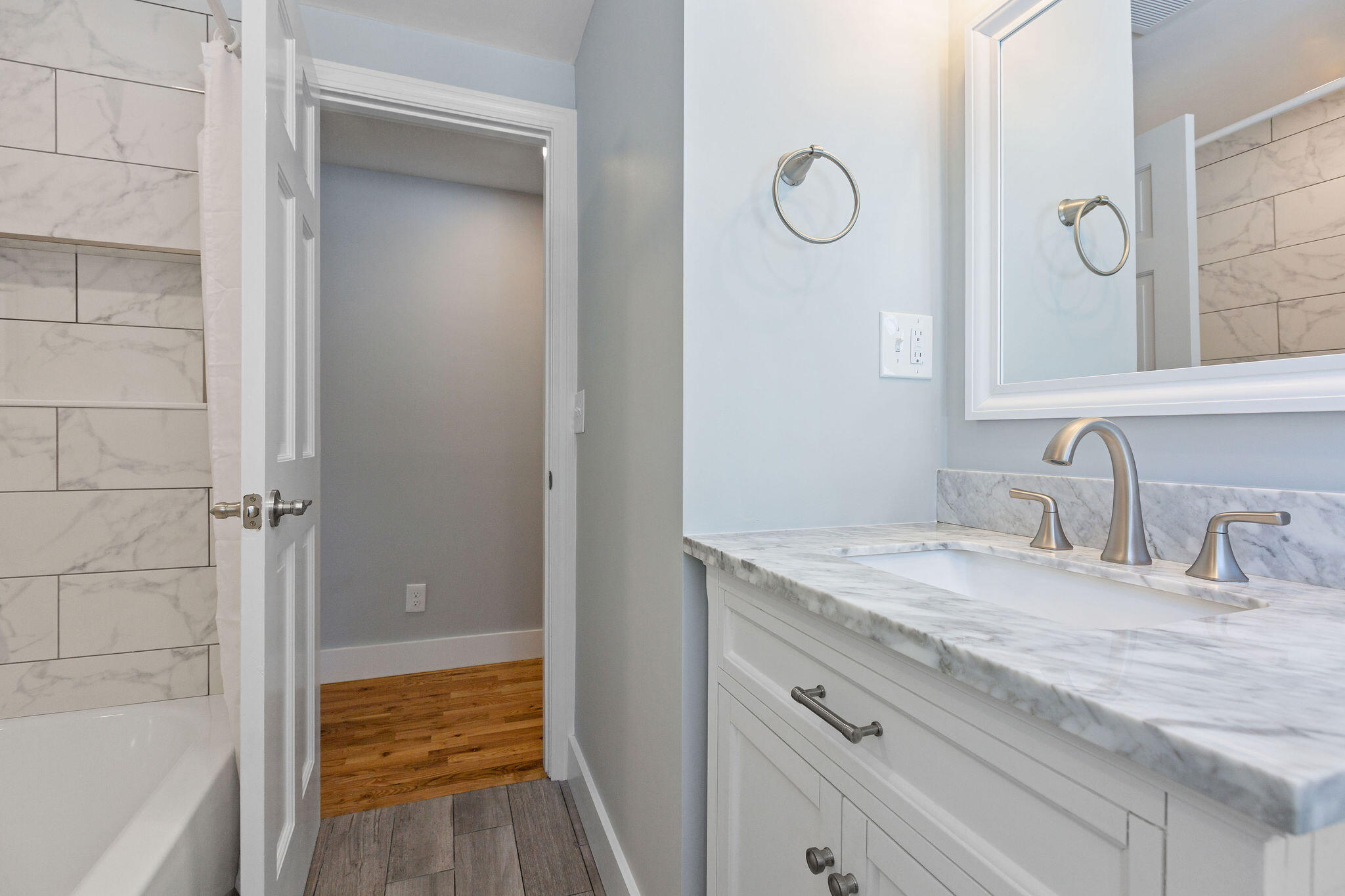 200 Lumbert Mill Road Centerville, MA 02632 - Photo 31 of 63 a bathroom with a granite countertop sink and a mirror