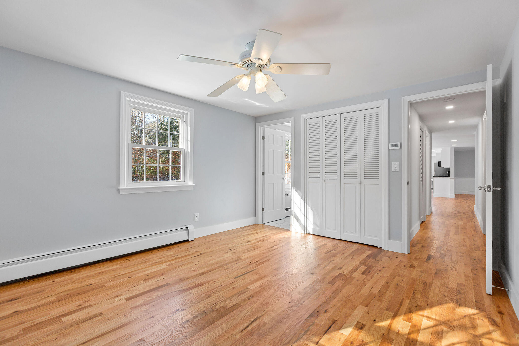 200 Lumbert Mill Road Centerville, MA 02632 - Photo 34 of 63 a view of an empty room with wooden floor and a window
