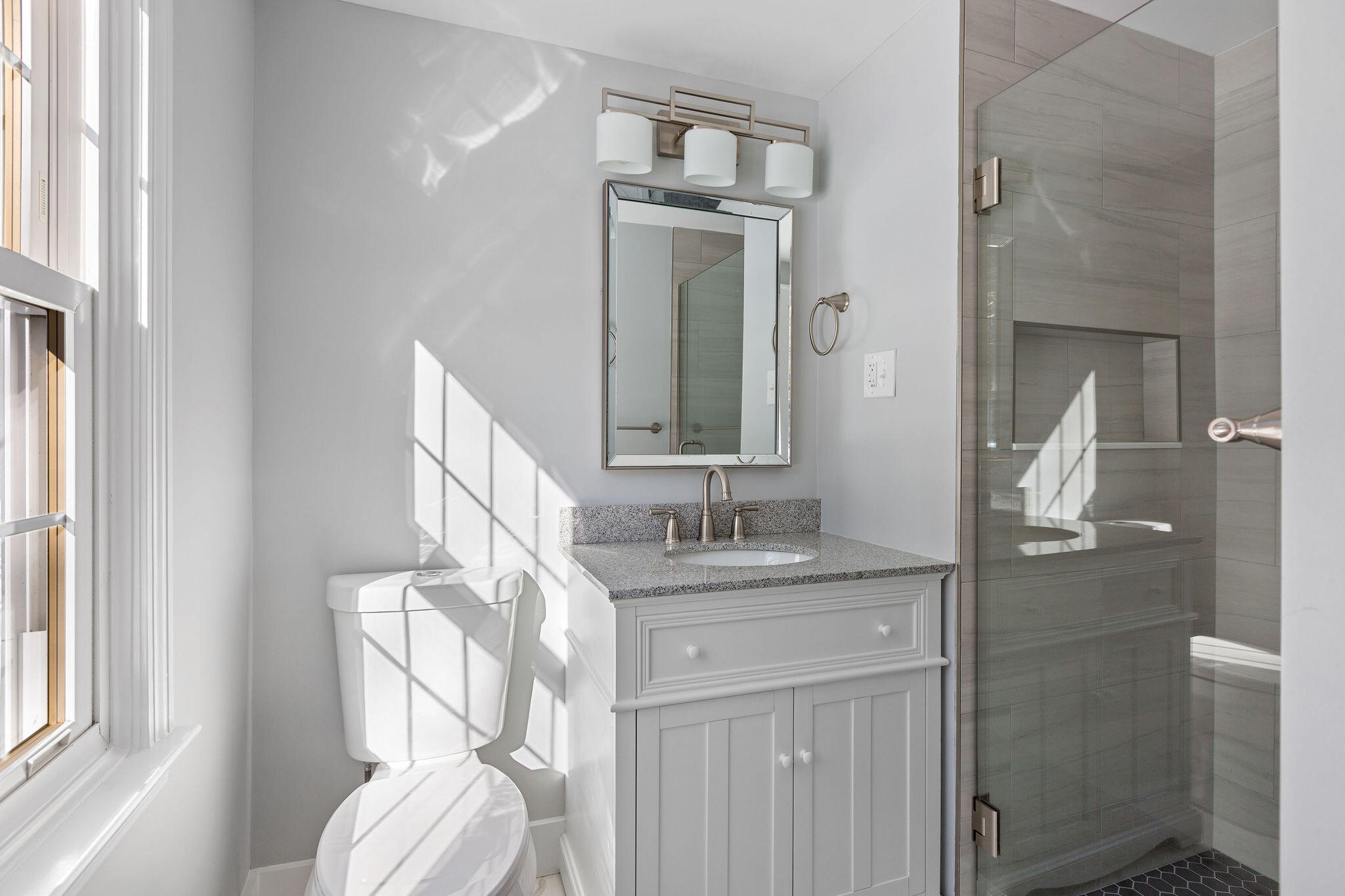 200 Lumbert Mill Road Centerville, MA 02632 - Photo 36 of 63 a bathroom with a granite countertop sink and a mirror