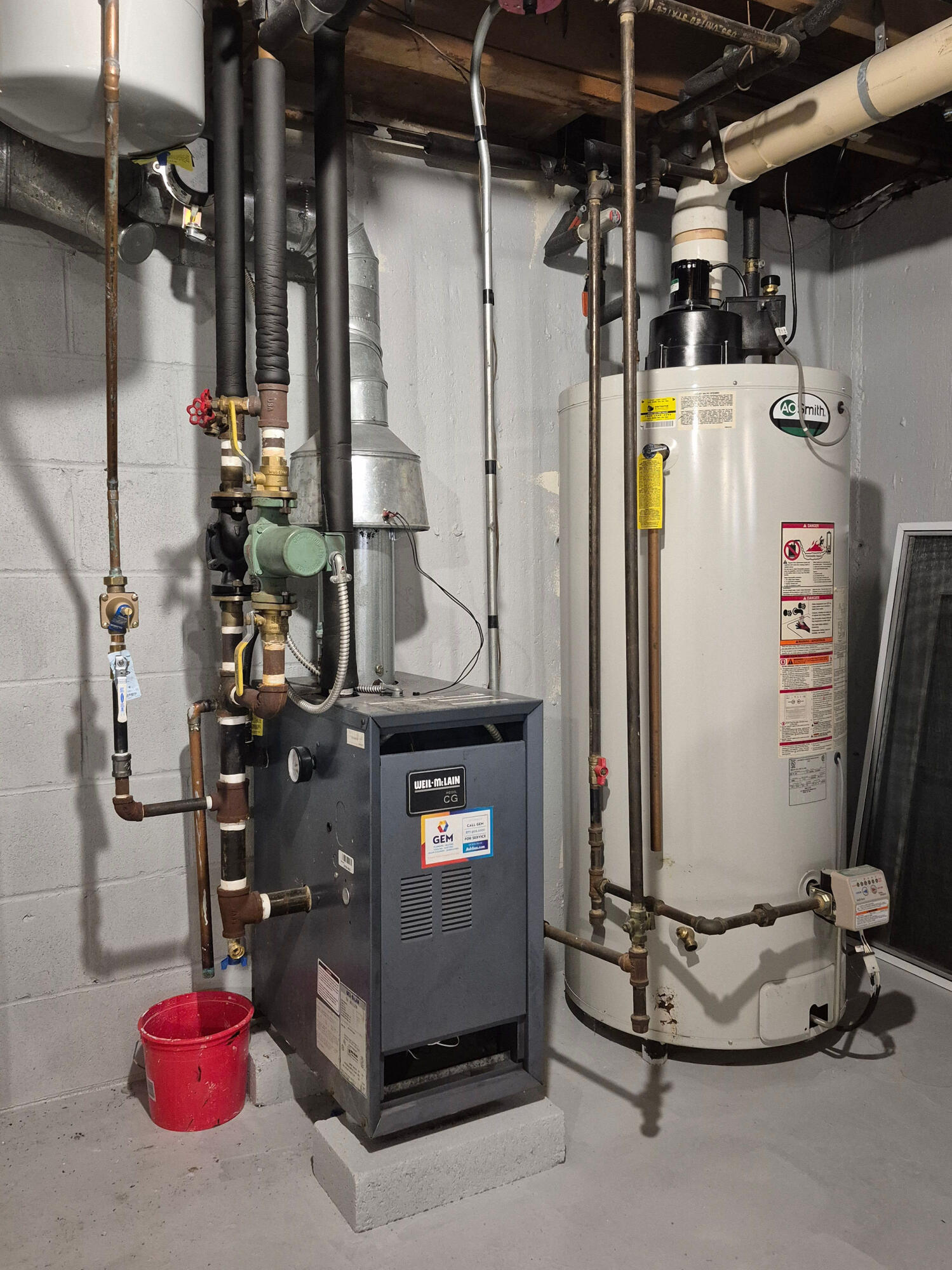 200 Lumbert Mill Road Centerville, MA 02632 - Photo 42 of 63 a room with water heater and storage