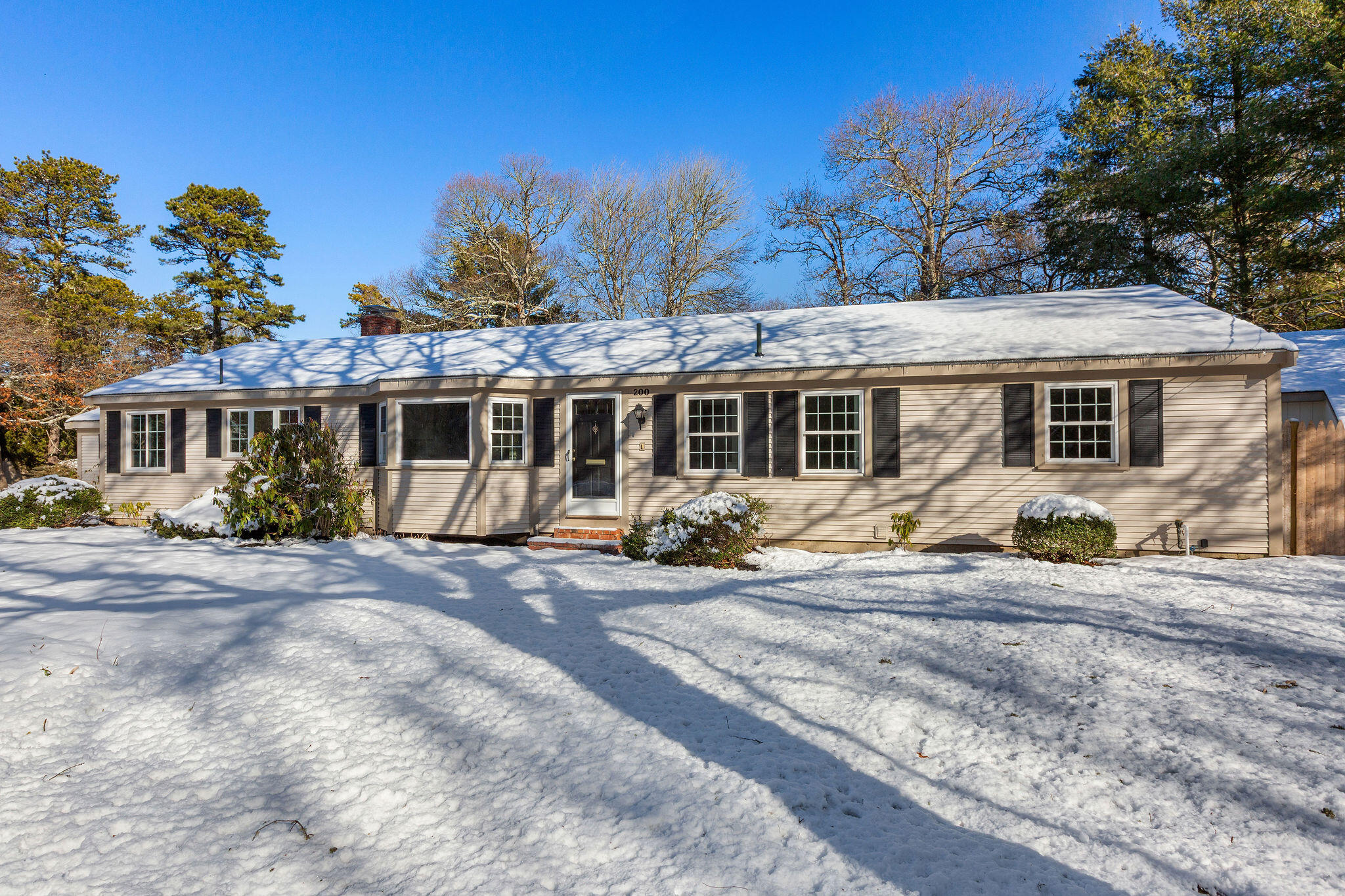 200 Lumbert Mill Road Centerville, MA 02632 - Photo 60 of 63 a view of a house with a yard
