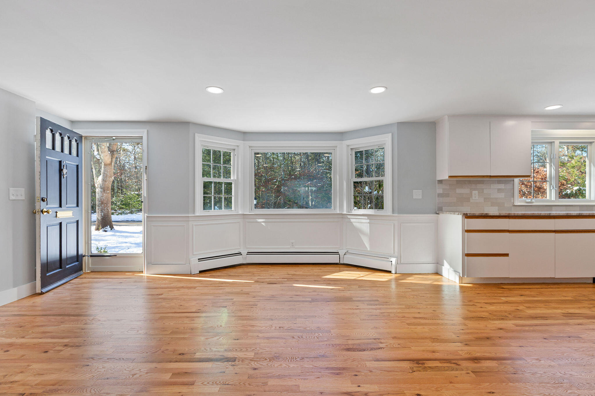200 Lumbert Mill Road Centerville, MA 02632 - Photo 7 of 63 a view of a kitchen with wooden floor and a window