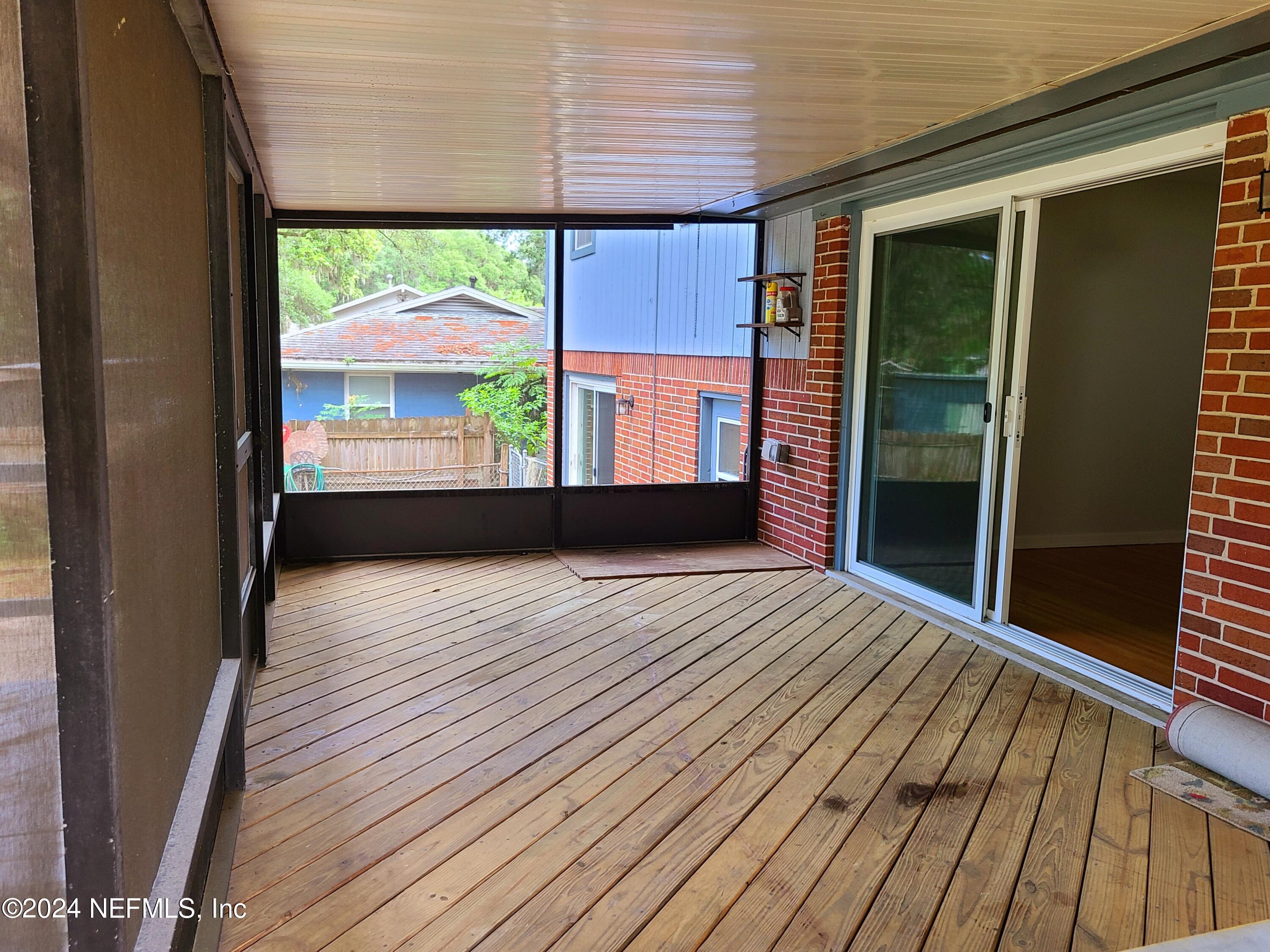 4620 Morris Road Jacksonville, FL 32225 - Photo 11 of 39 a view of a room with wooden floor and a window