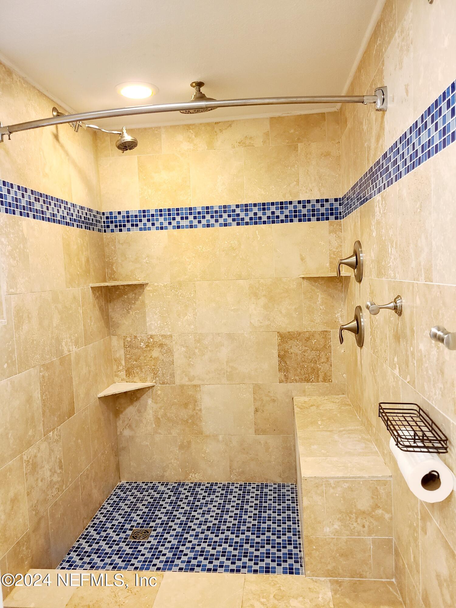 4620 Morris Road Jacksonville, FL 32225 - Photo 16 of 39 a bathroom with a shower