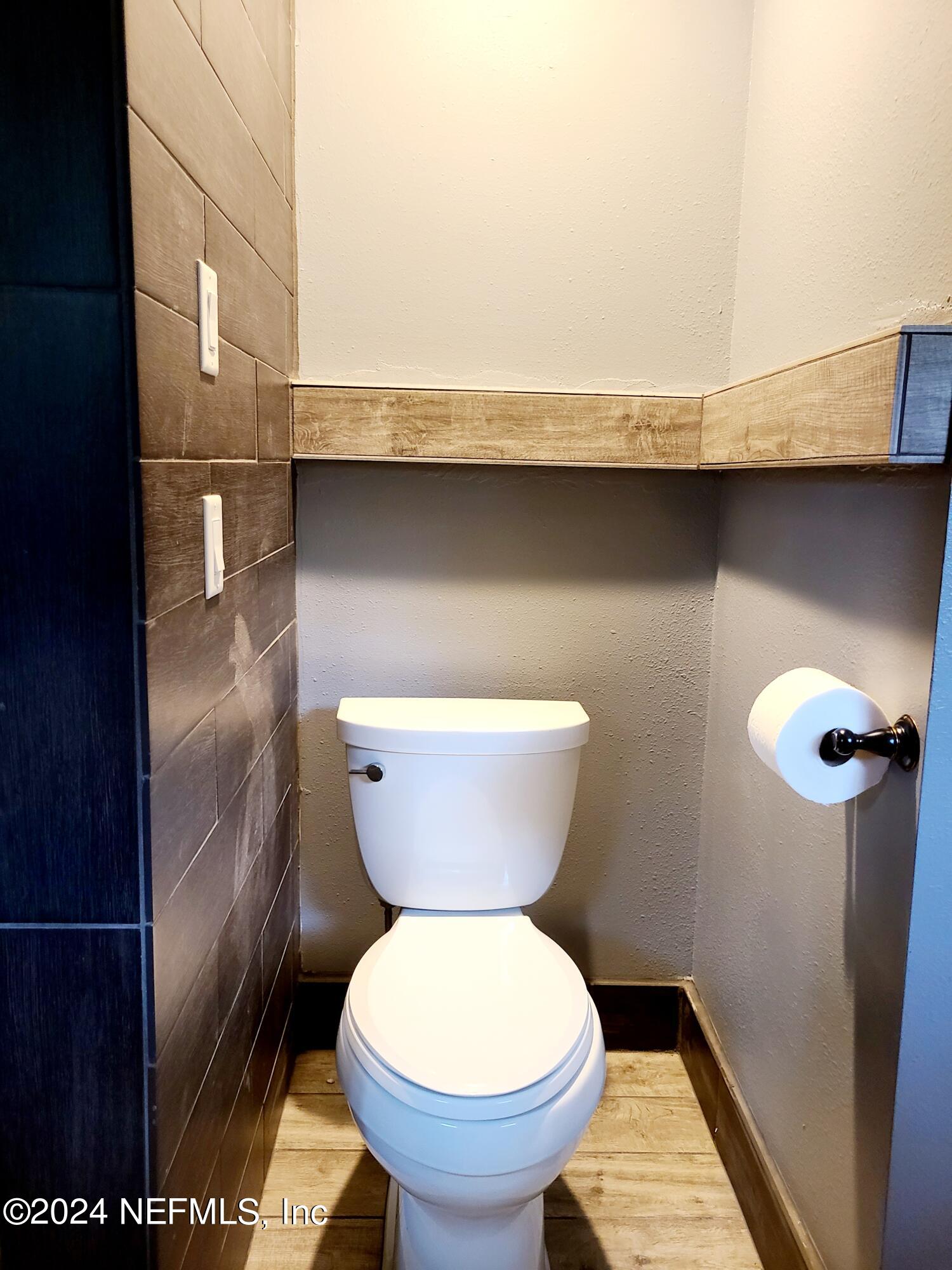 4620 Morris Road Jacksonville, FL 32225 - Photo 22 of 39 a bathroom with a toilet and a sink