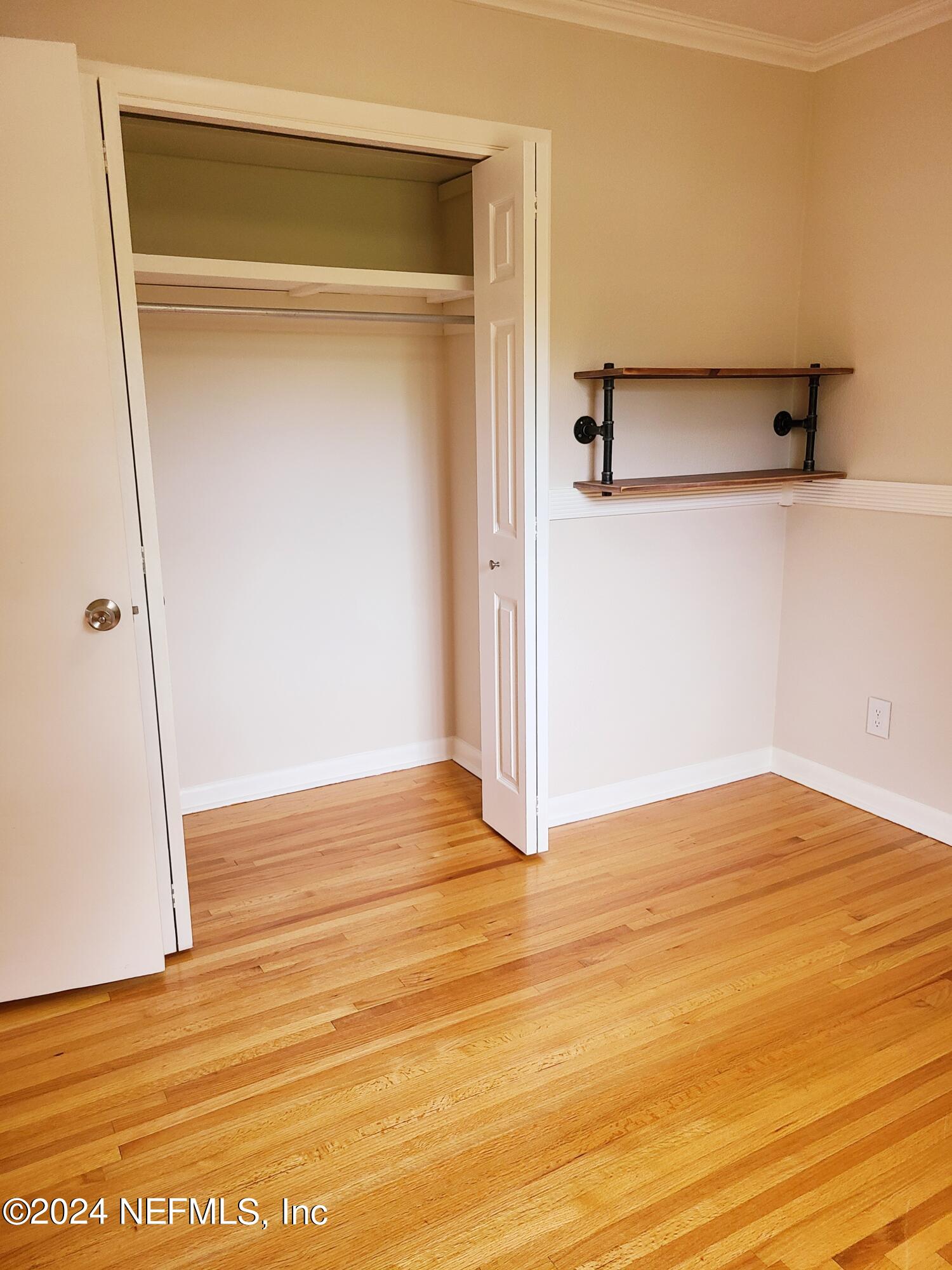 4620 Morris Road Jacksonville, FL 32225 - Photo 25 of 39 a view of a room with wooden floor