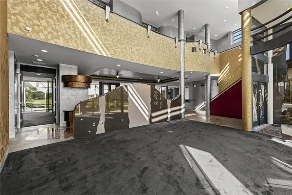 a kitchen with stainless steel appliances granite countertop a sink and a stove