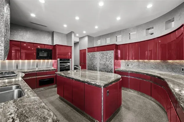 a bathroom with a double vanity sink and mirror