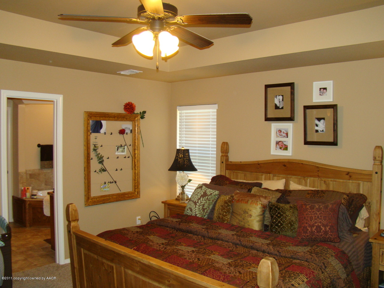 3715 Arden Road Amarillo, TX 79118 - Photo 15 of 24 a bedroom with a bed and window