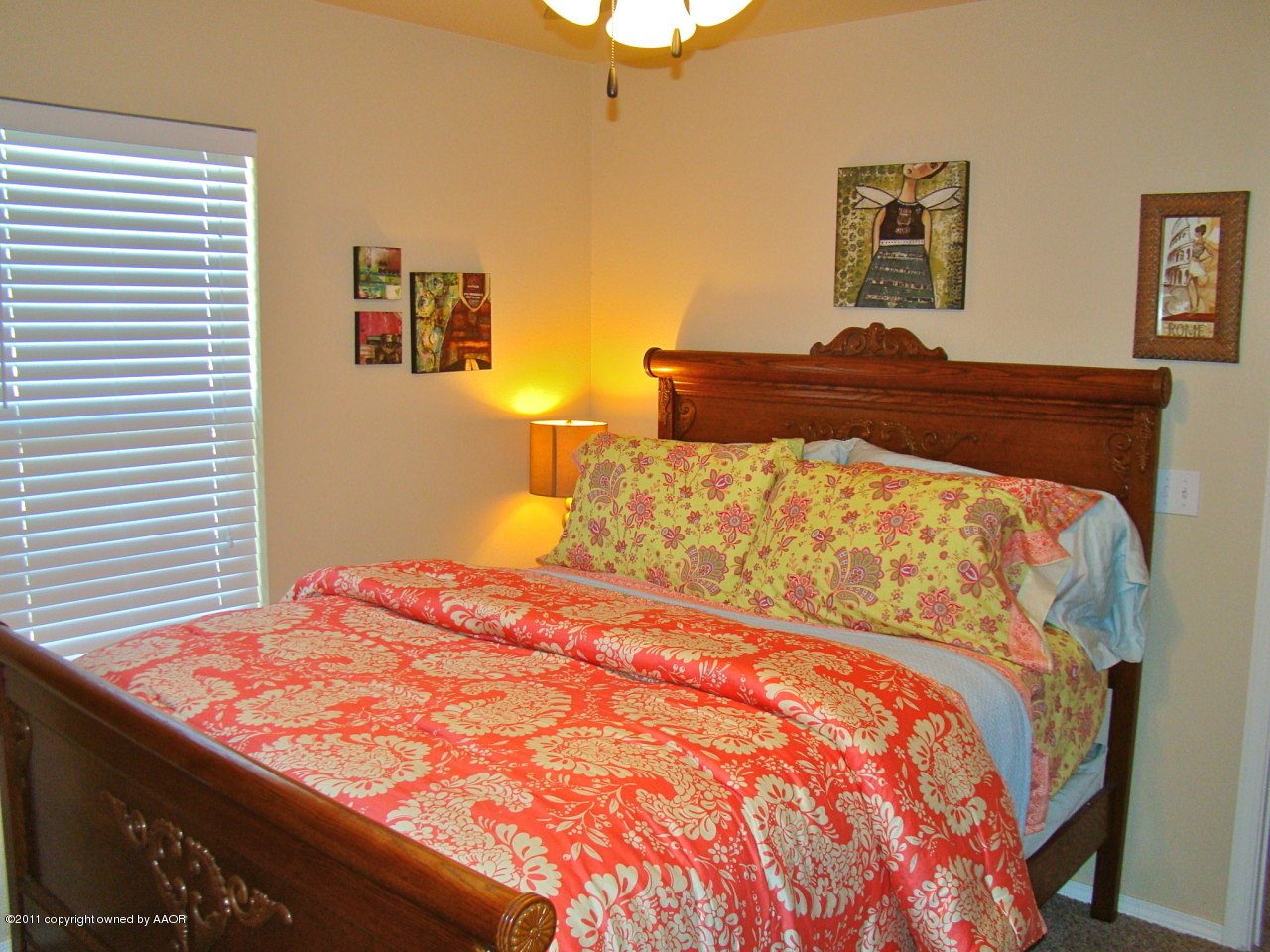 3715 Arden Road Amarillo, TX 79118 - Photo 23 of 24 a bedroom with a bed and painting on the wall