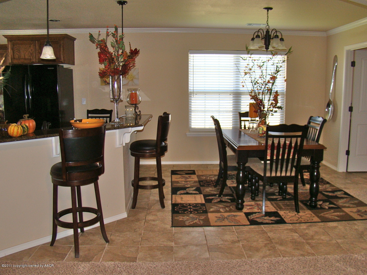 3715 Arden Road Amarillo, TX 79118 - Photo 5 of 24 a view of a dining room with furniture window and outside view