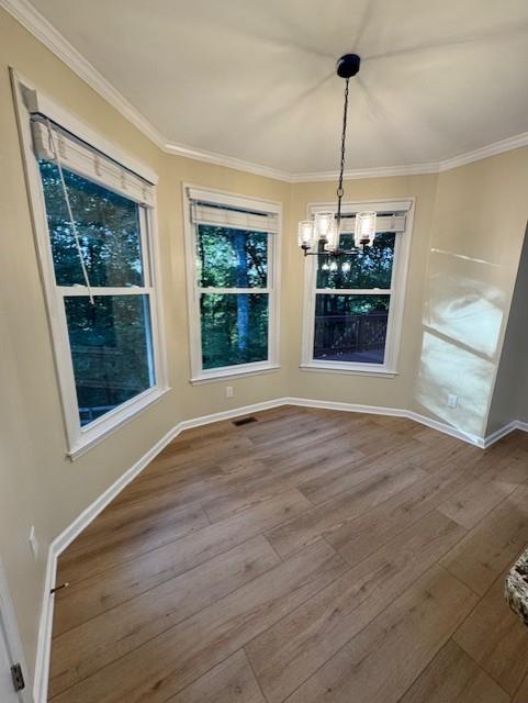 4055 Vista Point Lane Suwanee, GA 30024 - Photo 20 of 42 a view of a room with wooden floor chandeliers and kitchen view