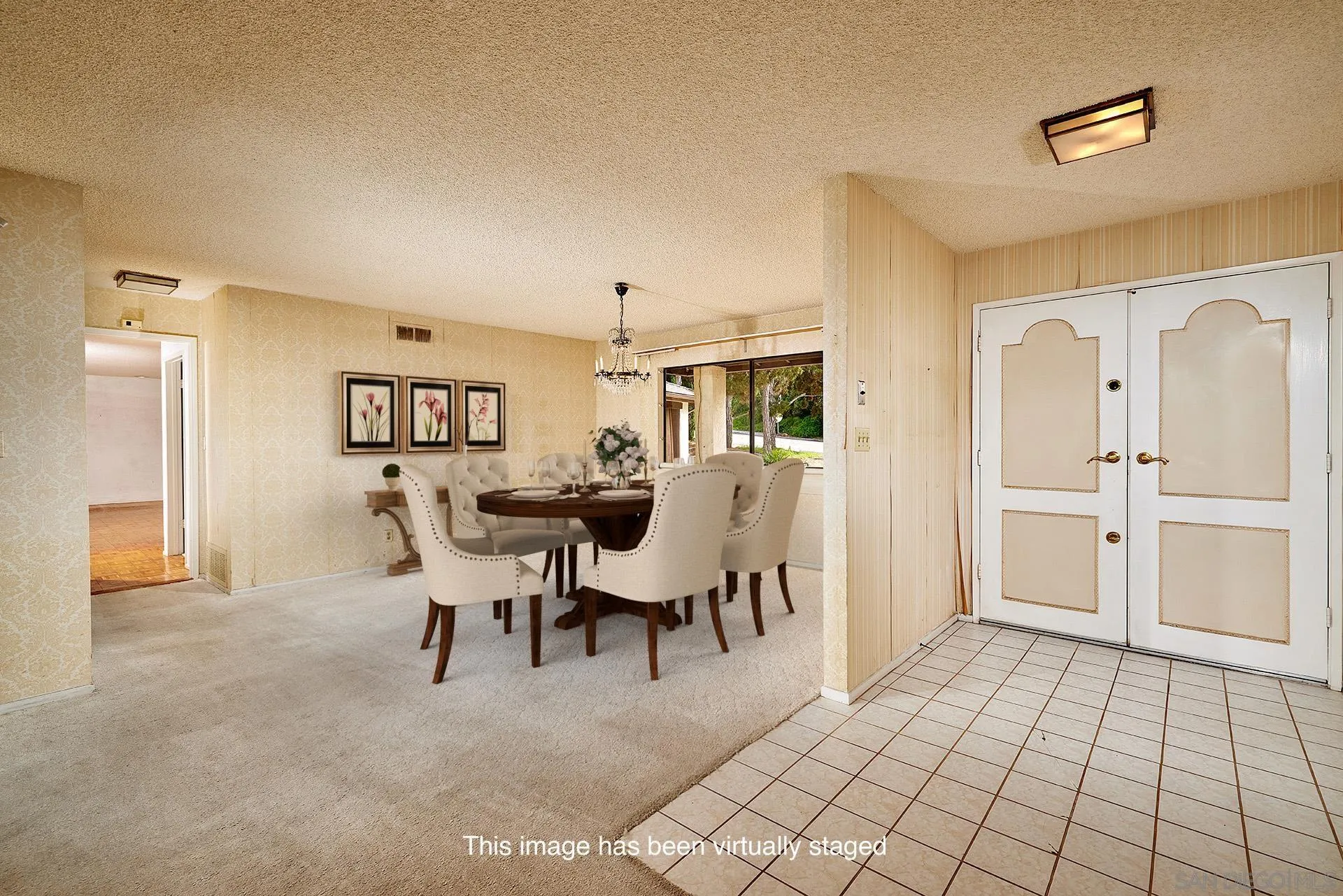 7774 Via Capri La Jolla, CA 92037 - Photo 13 of 45 a view of a dining room with furniture