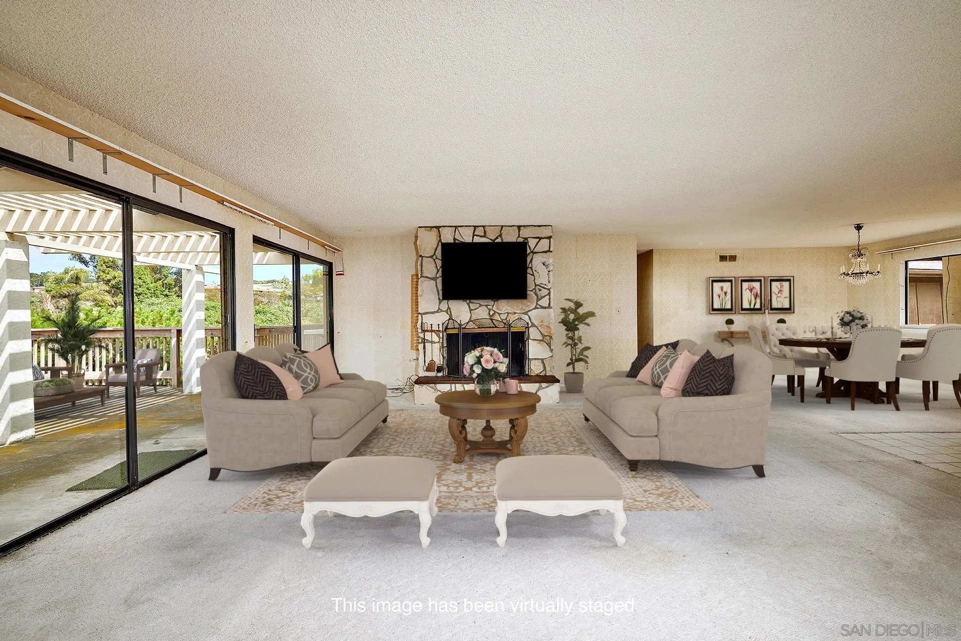 7774 Via Capri La Jolla, CA 92037 - Photo 14 of 45 a living room with furniture and a flat screen tv
