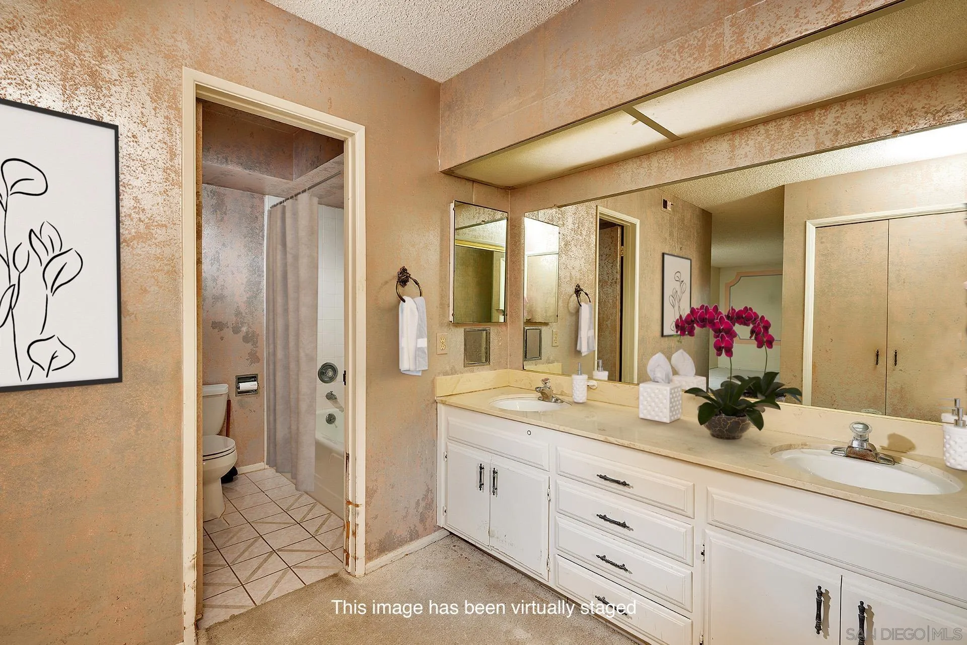 7774 Via Capri La Jolla, CA 92037 - Photo 18 of 45 a bathroom with a double vanity sink mirror and shower