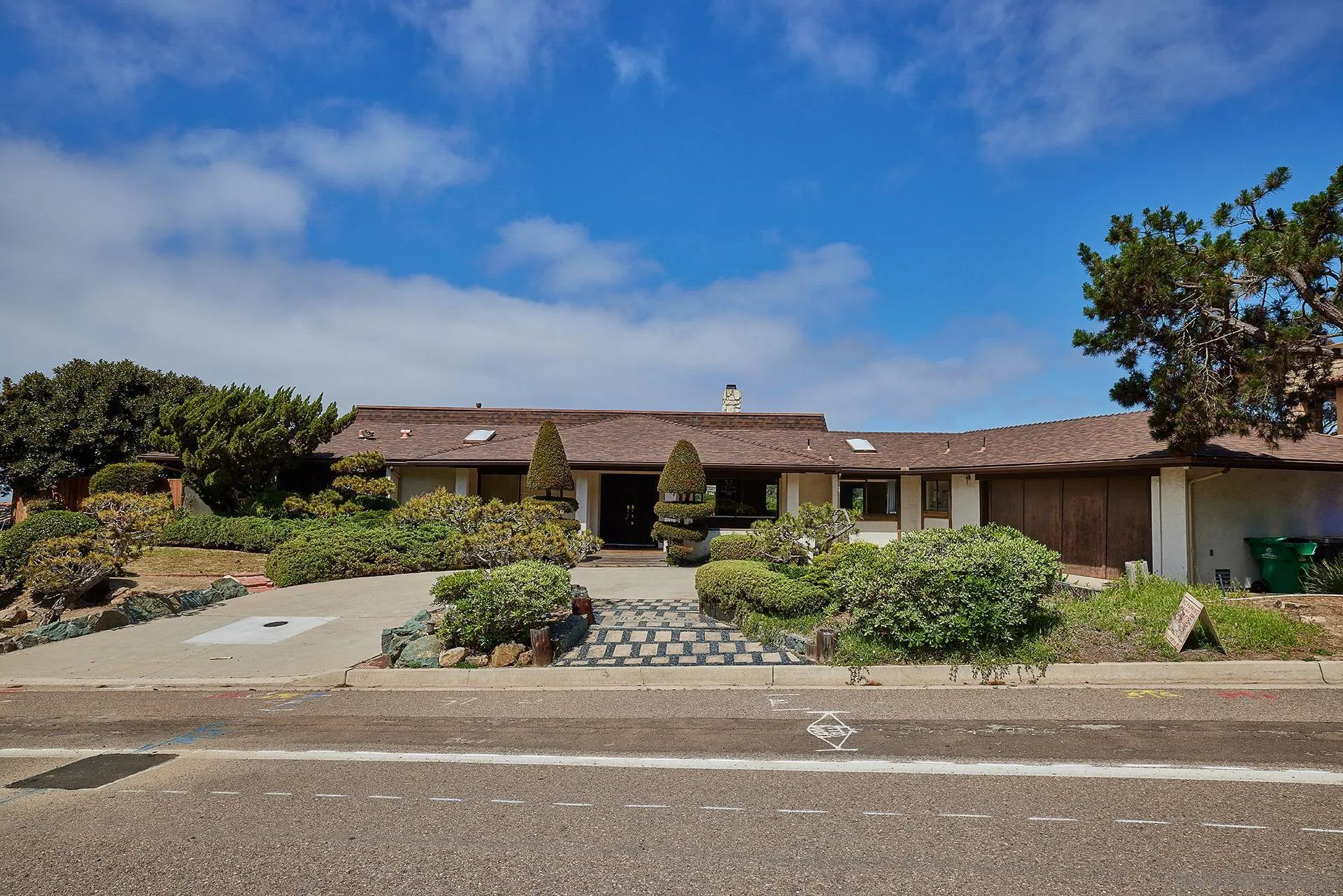 7774 Via Capri La Jolla, CA 92037 - Photo 27 of 45 front view of a house with a street