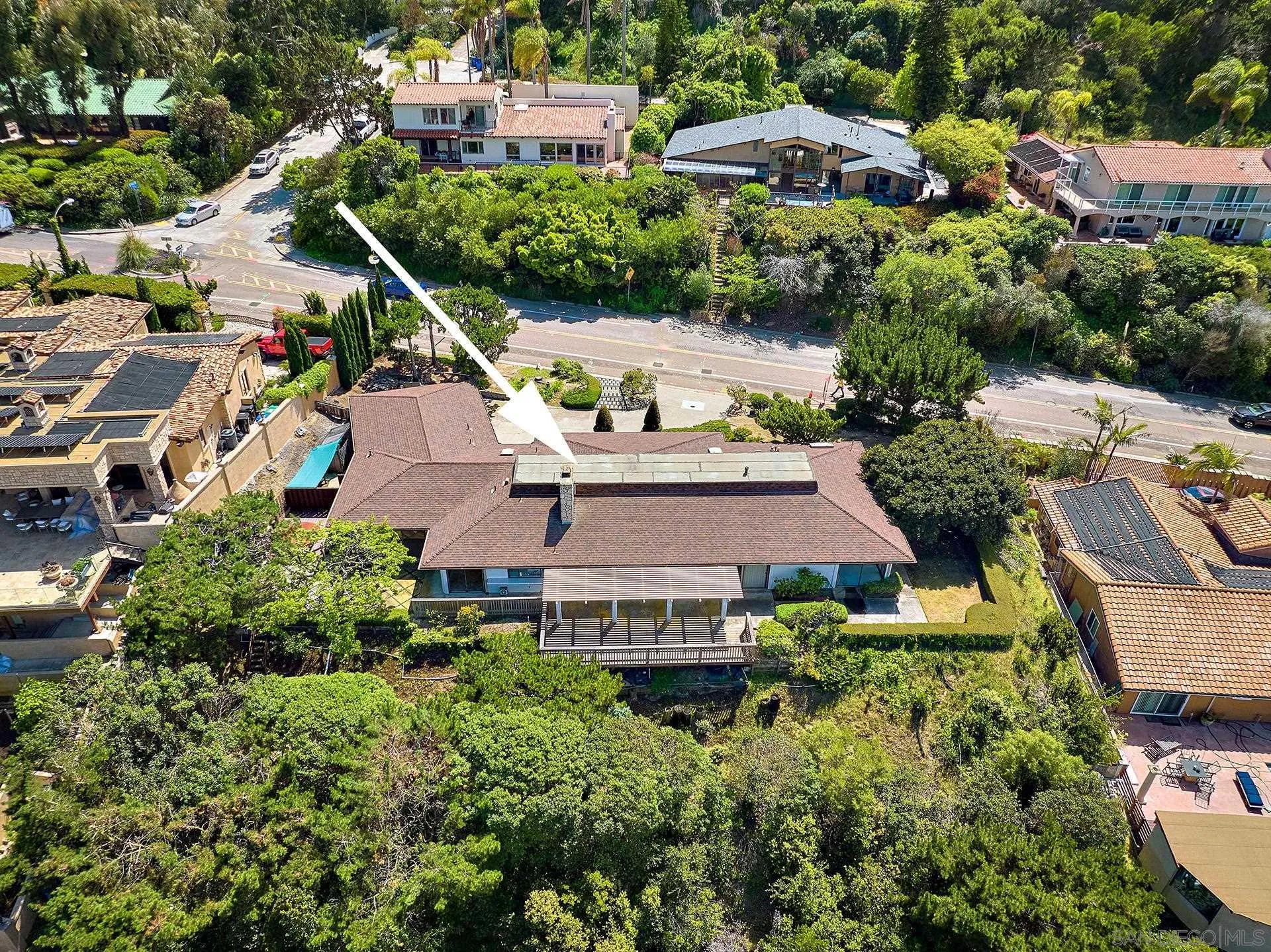 7774 Via Capri La Jolla, CA 92037 - Photo 32 of 45 an aerial view of multiple houses with yard
