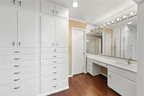 a view of an empty walk in closet