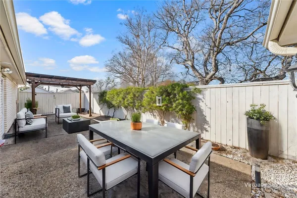 a backyard of a house with seating space