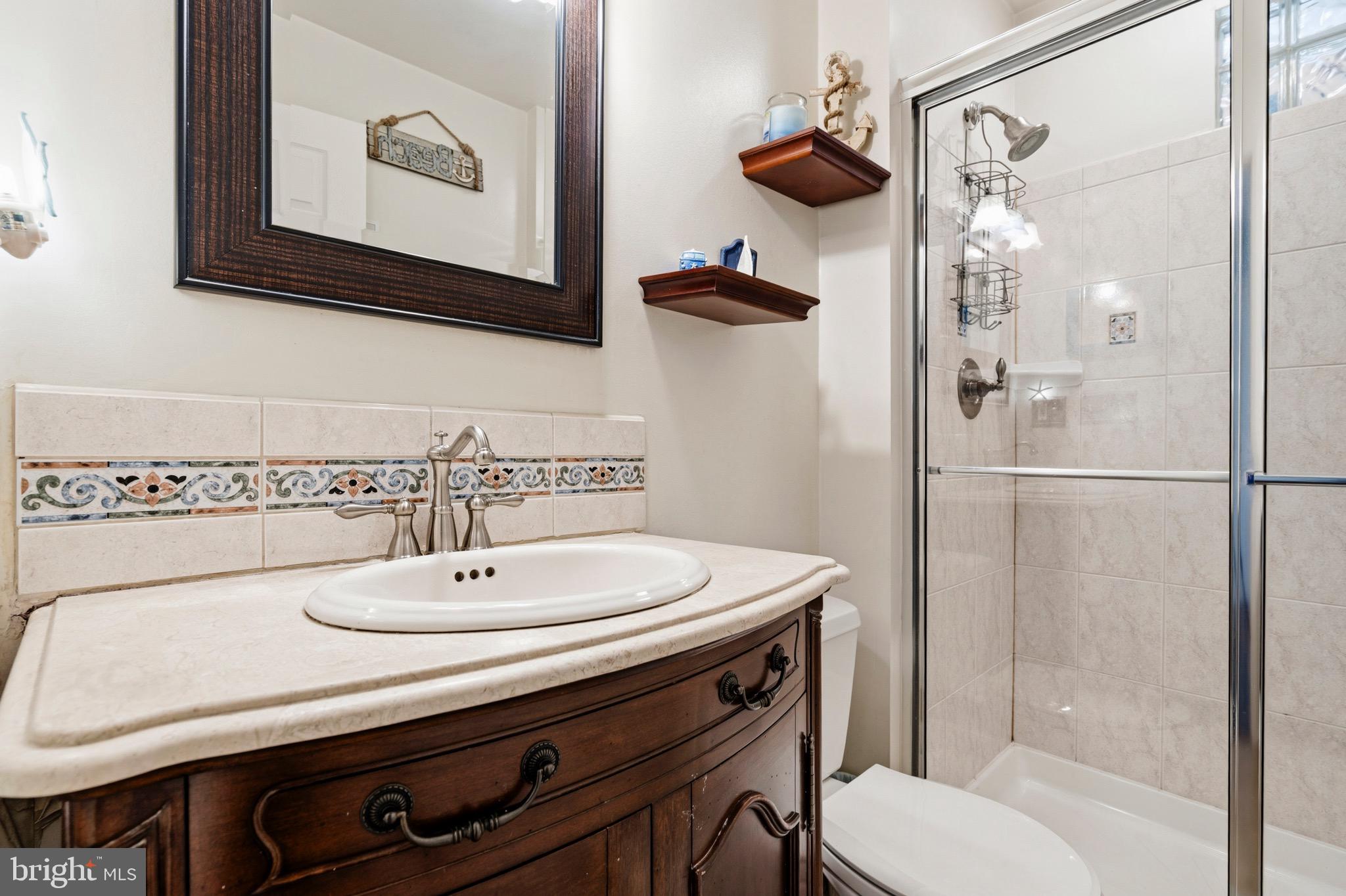1260 Hillside Road Pasadena, MD 21122 - Photo 15 of 50 Main level full bathroom