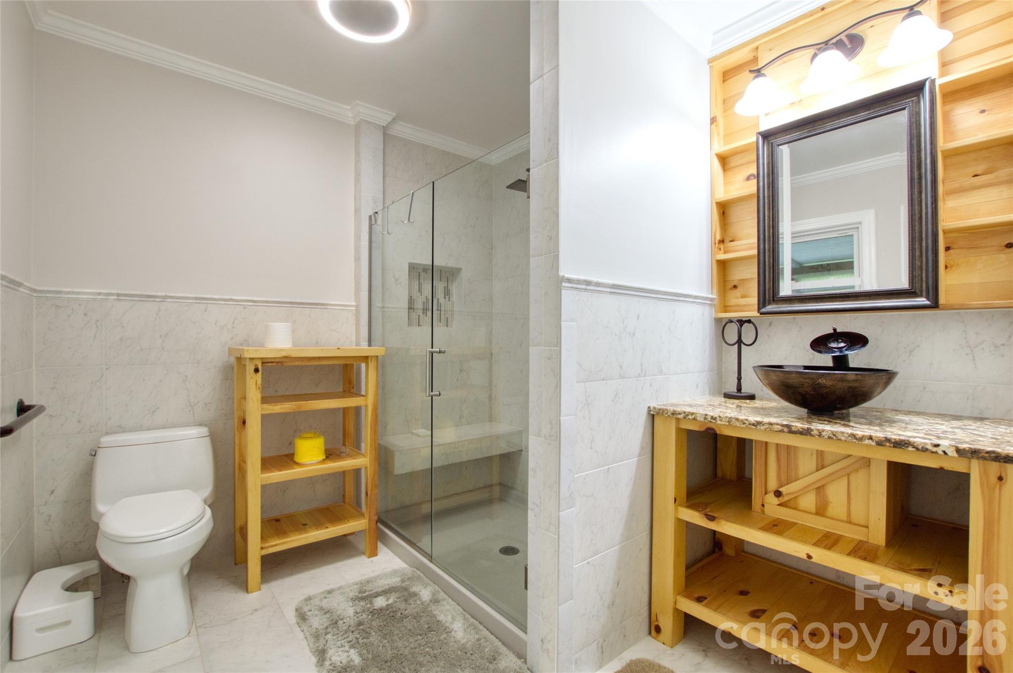 204 Clinton Avenue Clover, SC 29710 - Photo 11 of 26 a bathroom with a toilet sink and shower