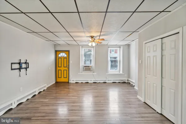 a view of entryway with wooden floor