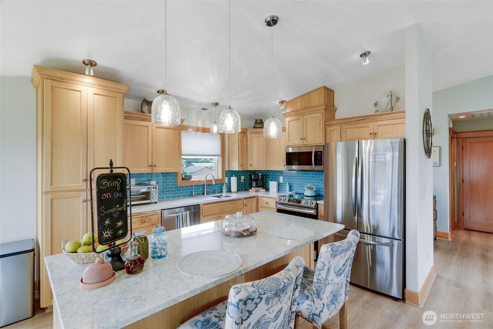 33410 G Street Ocean Park, WA 98640 - Photo 19 of 40 a kitchen with stainless steel appliances granite countertop a refrigerator a stove and a sink