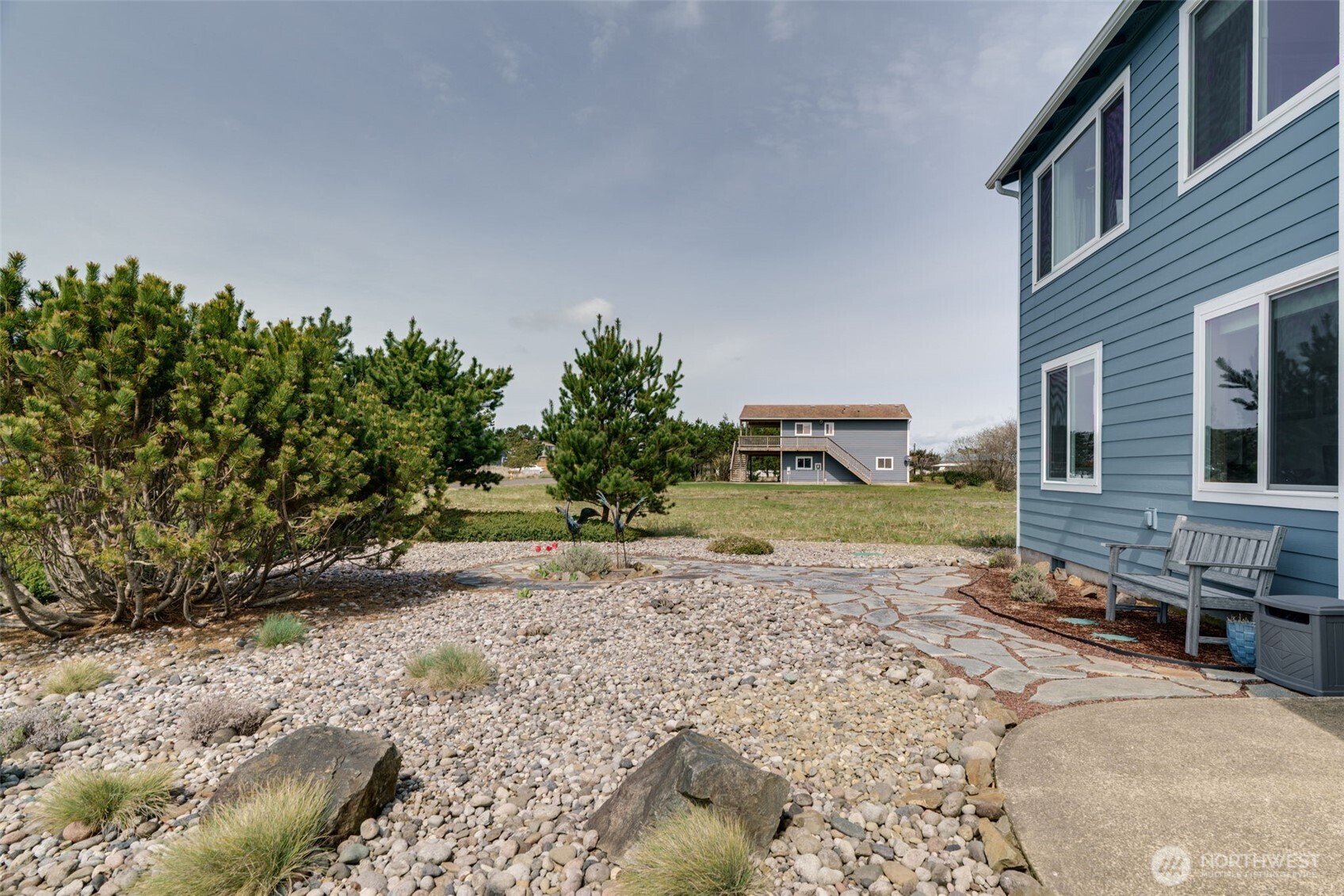 33410 G Street Ocean Park, WA 98640 - Photo 36 of 40 a view of a backyard with a garden
