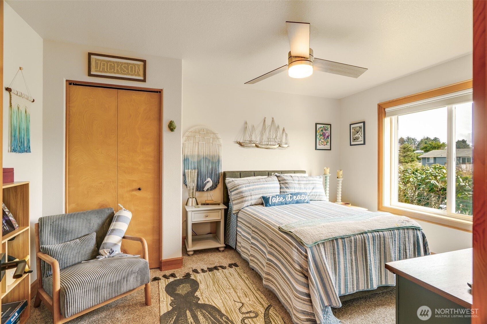 33410 G Street Ocean Park, WA 98640 - Photo 7 of 40 a bedroom with a bed and wooden floor