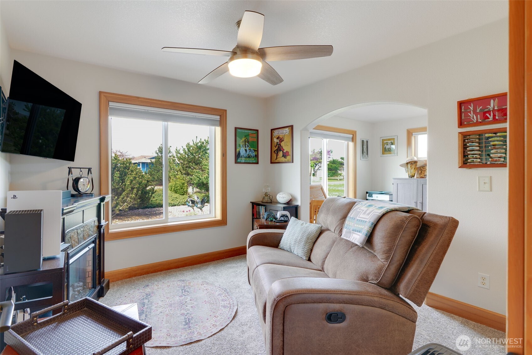 33410 G Street Ocean Park, WA 98640 - Photo 8 of 40 a living room with furniture and a flat screen tv