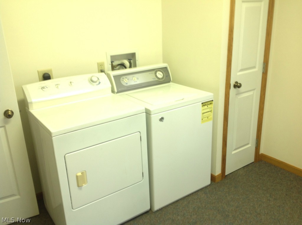 10860 West Calla Road Salem, OH 44460 - Photo 11 of 18 Convenient first floor laundry room with extra storage, also has a doorway to the outside deck