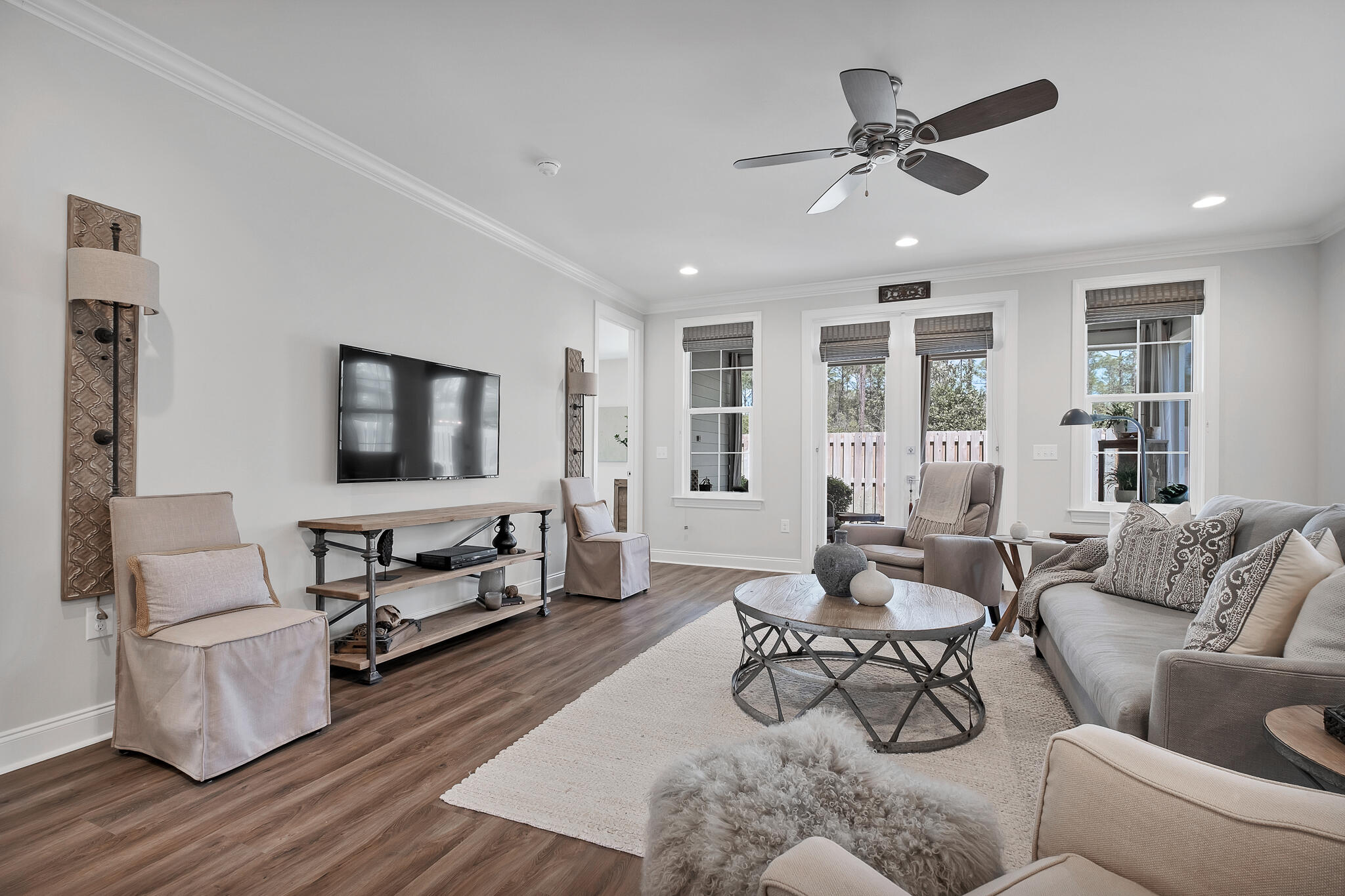 21 Windrow Way Rosemary Beach, FL 32461 - Photo 14 of 38 a living room with furniture and a flat screen tv with wooden floor