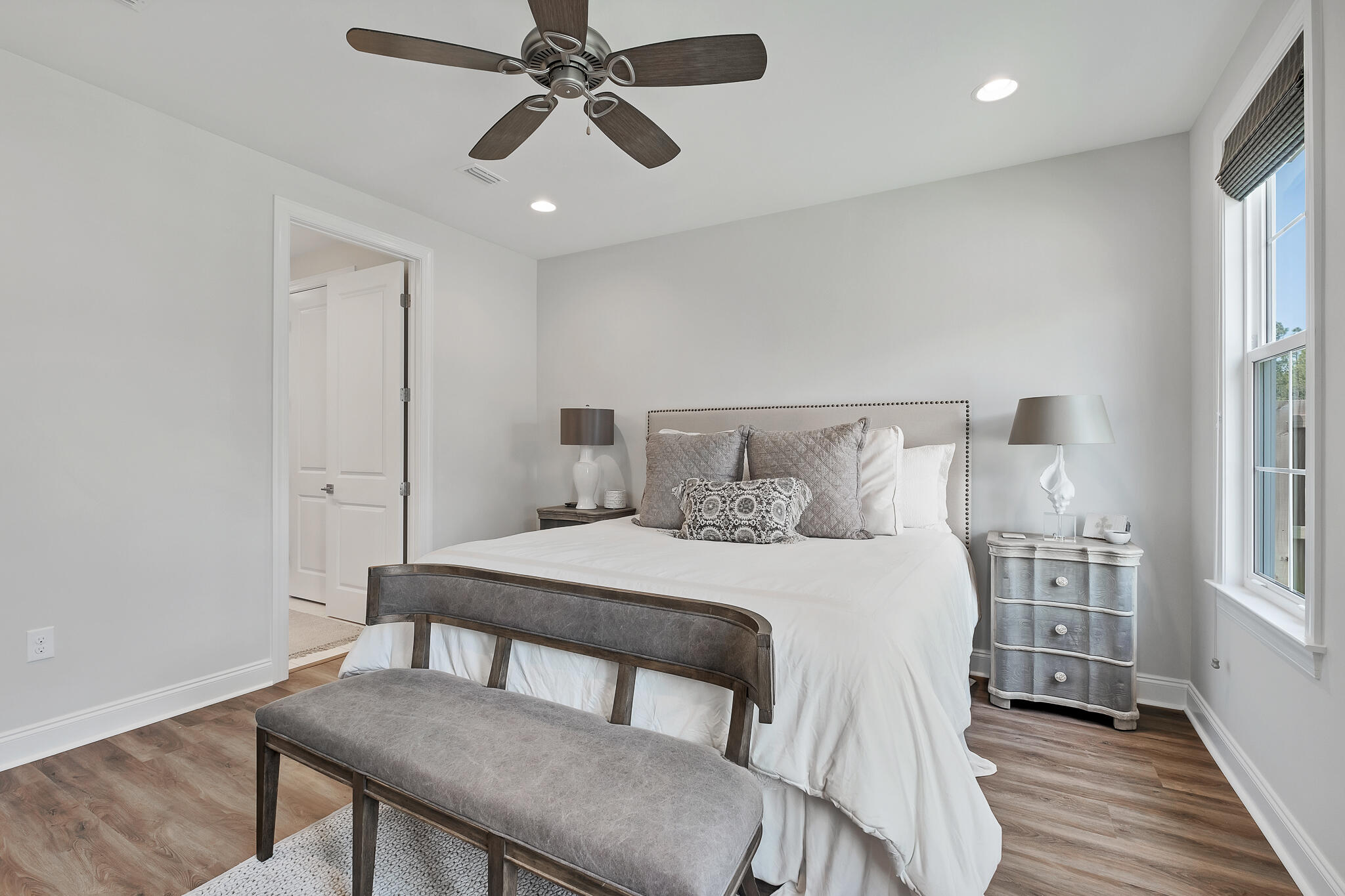 21 Windrow Way Rosemary Beach, FL 32461 - Photo 21 of 38 a bedroom with a bed and a chandelier