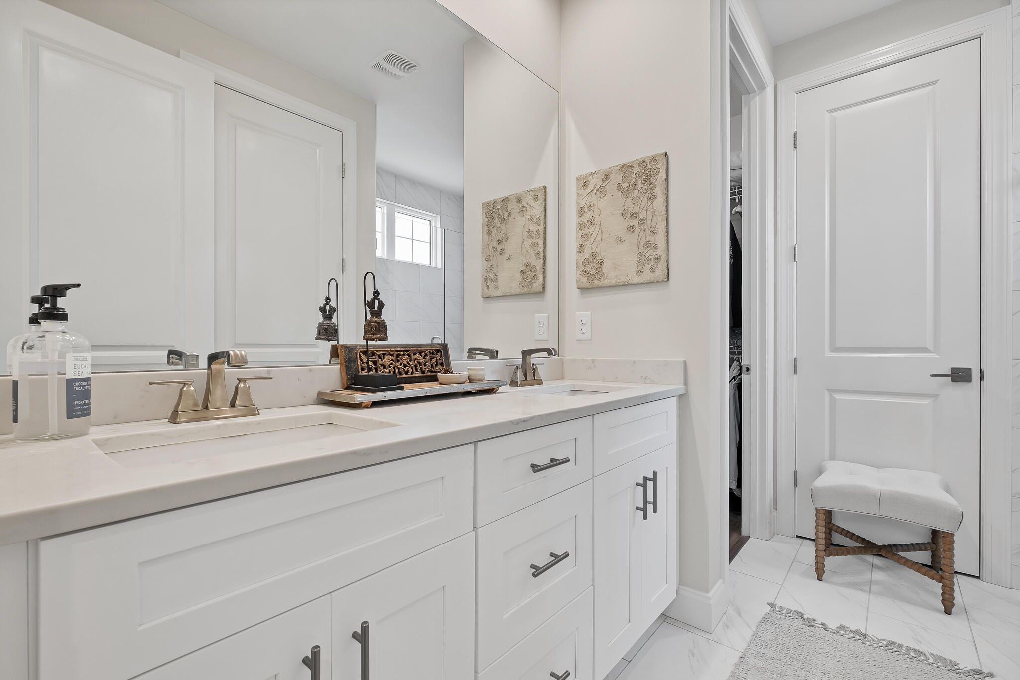 21 Windrow Way Rosemary Beach, FL 32461 - Photo 24 of 38 a bathroom with a double vanity sink and a mirror